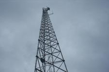 The microwave tower with two dishes.