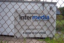 A sign with contact info for Intermedia.